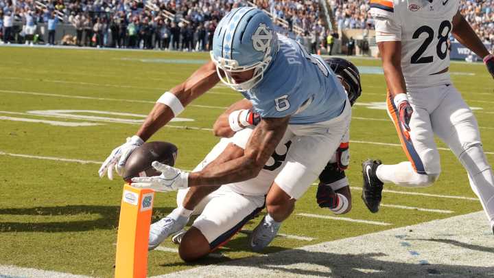 North Carolina falls inches short of overtime upset of Virginia