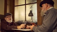 Old men in pub do not need words to express their love