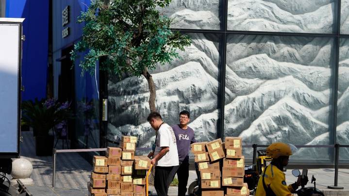 China's economy slows to 4.8% annual growth in July-September, hit by tariffs and slack demand