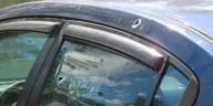 Car damaged, no injuries reported after shots fired in Kentucky neighborhood