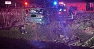 Driver in custody after fiery crash into Wichita pedestrian bridge