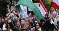Hundreds of thousands of Hungarians attend rival rallies in Budapest as Orbán faces election test