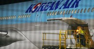 Koreans tied to alleged online scams in Cambodia arrive home