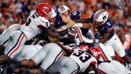 No. 10 Georgia forces a goal-line fumble to seize momentum and beat Auburn 20
