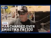 Former Bikie Charged After Appearing In Court With A Nazi Tattoo On His Face