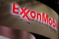 Exxon expects to cut Singapore staff by 10% to 15% by end