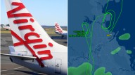 Virgin Australia plane circles Brisbane before turning back after mid