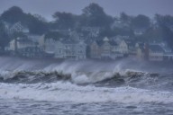 3 missing and dozens rescued after remnants of a typhoon lash western Alaska