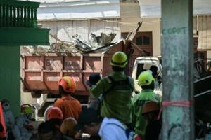 Death toll from Indonesia school collapse rises to 63