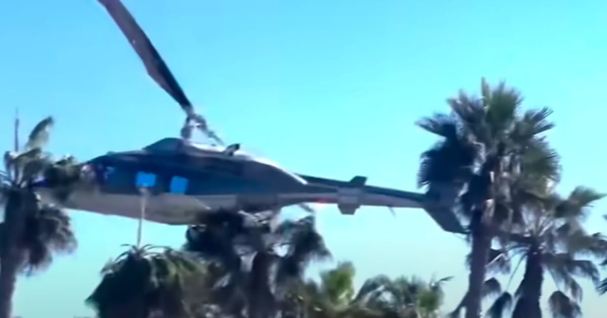Terrifying Footage Shows Beach Heroes Rush to Rescue Child Pinned Under Helicopter Crash
