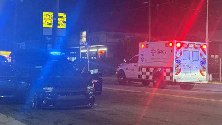 Woman injured by glass after shots fired along Cheshire Bridge Road
