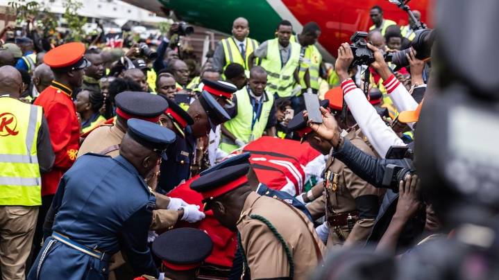 Kenya police fire at mourners and 2 die as violence erupts at viewing of body of ex