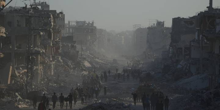US troops land in Israel and Palestinians return to ruins as ceasefire holds