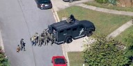 Officer shot, suspect barricaded inside Sandy Springs home, police say