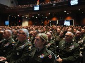 U.S. is facing an ‘invasion from within,’ Trump tells gathering of top military commanders