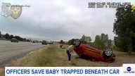 Baby pulled from overturned vehicle in dramatic rescue