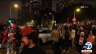 Los Angeles police disperse large crowd near Grand Park in downtown LA; Waymo car damaged, LAPD says