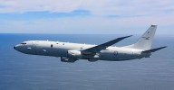 Chinese plane fired off flares near RAAF aircraft in South China Sea, Australian government said
