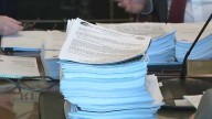 Gov. Kelly Ayotte says Executive Council use of paper waste taxpayer dollars, state police time