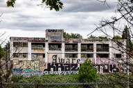 Blighted Portland building that housed Gordon’s Fireplace Shop sells for fraction of past price