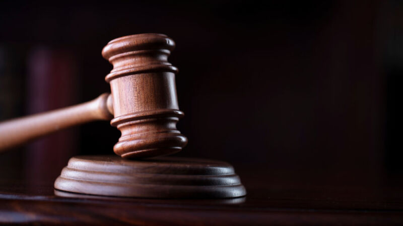 Driver charged for allegedly hitting, killing woman