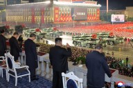 North Korea displays new long-range missile at military parade celebrating Kim Jong Un