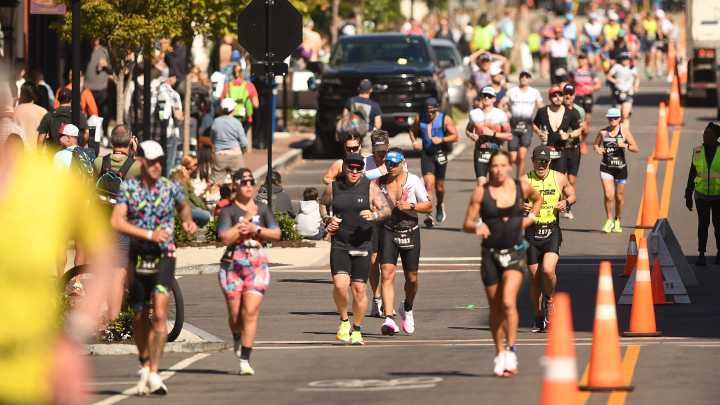 Fighting cancer and Alzheimer’s, athletes race IRONMAN 70.3 NC