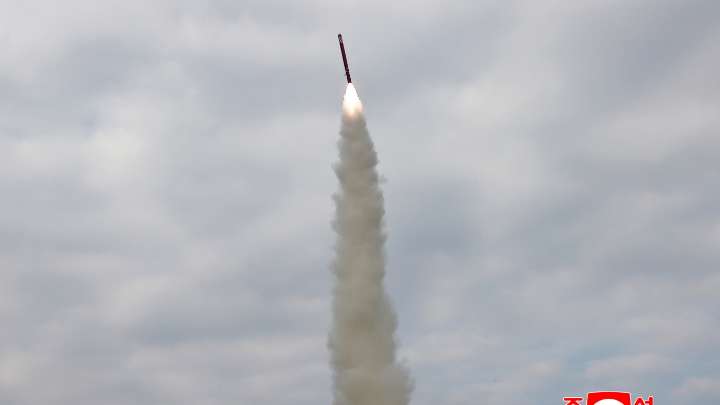 North Korea touts missile tests as Trump visits South Korea : NPR