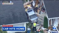 Car crashes into Hanover Park home on Woodlake Drive; 2 injured, police say