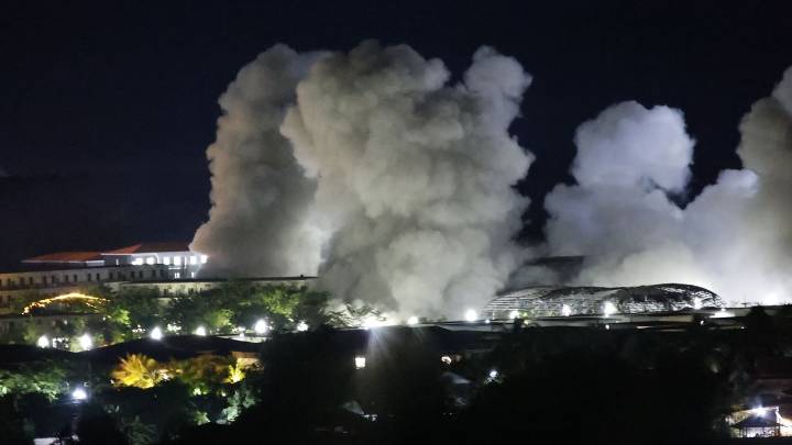 Stragglers from Myanmar scam center raided by army cross into Thailand as buildings are blown up