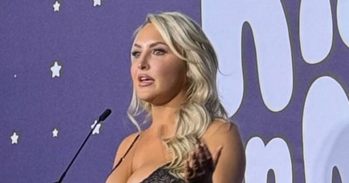 Emma Louise Jones stuns in 'wowzers' dress as guests 'don't know where to look'