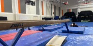 ‘I’m sad for my girls’: Kansas high school gymnastics ends after 52 years