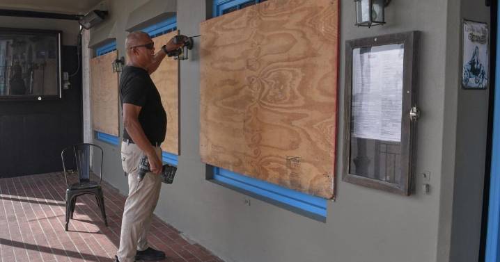 Imelda weakens after downing trees and power lines in Bermuda as a hurricane