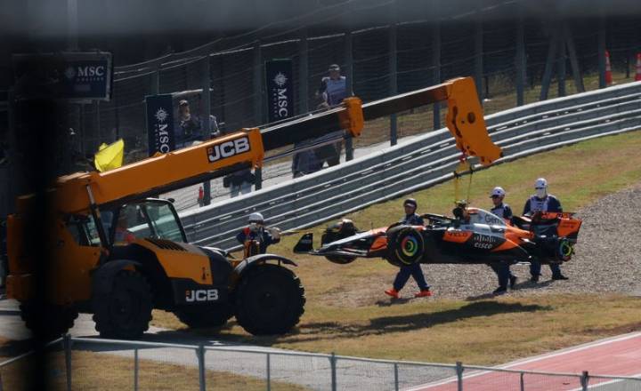 Motor racing-McLarens collide in U.S. GP sprint, both out