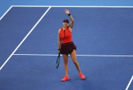 Tennis-Anisimova fights off Noskova challenge to win China Open