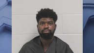 Carrollton man charged in child assault after peeping incidents