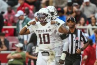 Reed throws for 280 yards and 3 TDs, runs for another score as No. 4 Texas A&M beats Arkansas 45