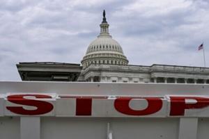 Asian stocks mixed, Wall St futures drop as US heads for shutdown