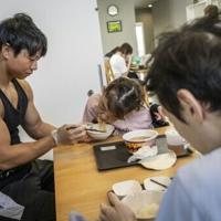 Young bodybuilders lift Japan's ailing care sector