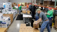 These two volunteers help serve food pantries across eastern Wisconsin