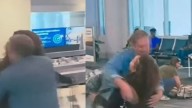 Woman, Hugging Boyfriend, Quickly Distances Herself As Husband Walks In With Flowers: ‘Oscar