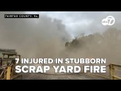 Fire at Lorton scrap yard leaves firefighter and six others injured, one critically