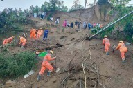 At Least 15 Dead, Including 2 Children, After Landslide Hits Bus