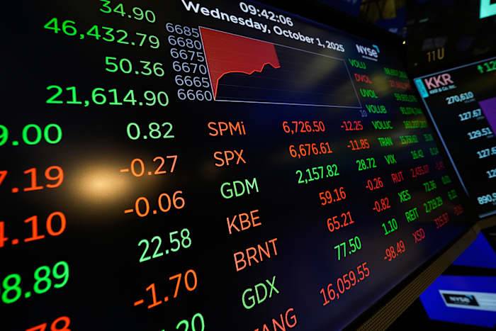 Asian shares are mixed as tech shares lead Wall Street ticks to more records