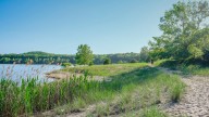 Lake Michigan parks face trail erosion issues due to more rain, foot traffic