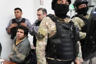 Argentine court sentences a former couple to years in prison over botched assassination of ex