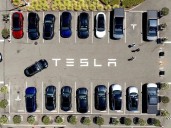 Kin of student killed in Tesla crash say flaw trapped her