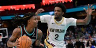 Morant scores 35 points, Memphis uses a third-quarter rally to beat New Orleans 128