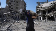 Thousands of Palestinians return to what's left of their homes as Gaza ceasefire takes effect
