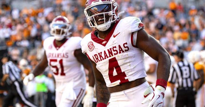 DeSean Bishop run for 146 yards and a TD to lead No. 12 Tennessee past Arkansas, 34